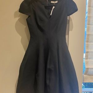 Black Cocktail dress cap sleeve,  above knees